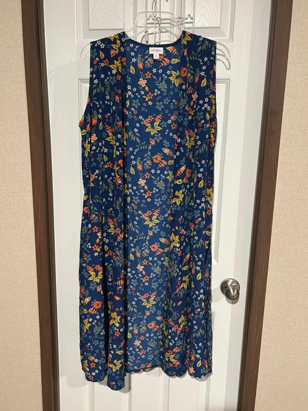 LuLaRoe Navy Floral Sleeveless Top with Orange and Yellow Blooms medium